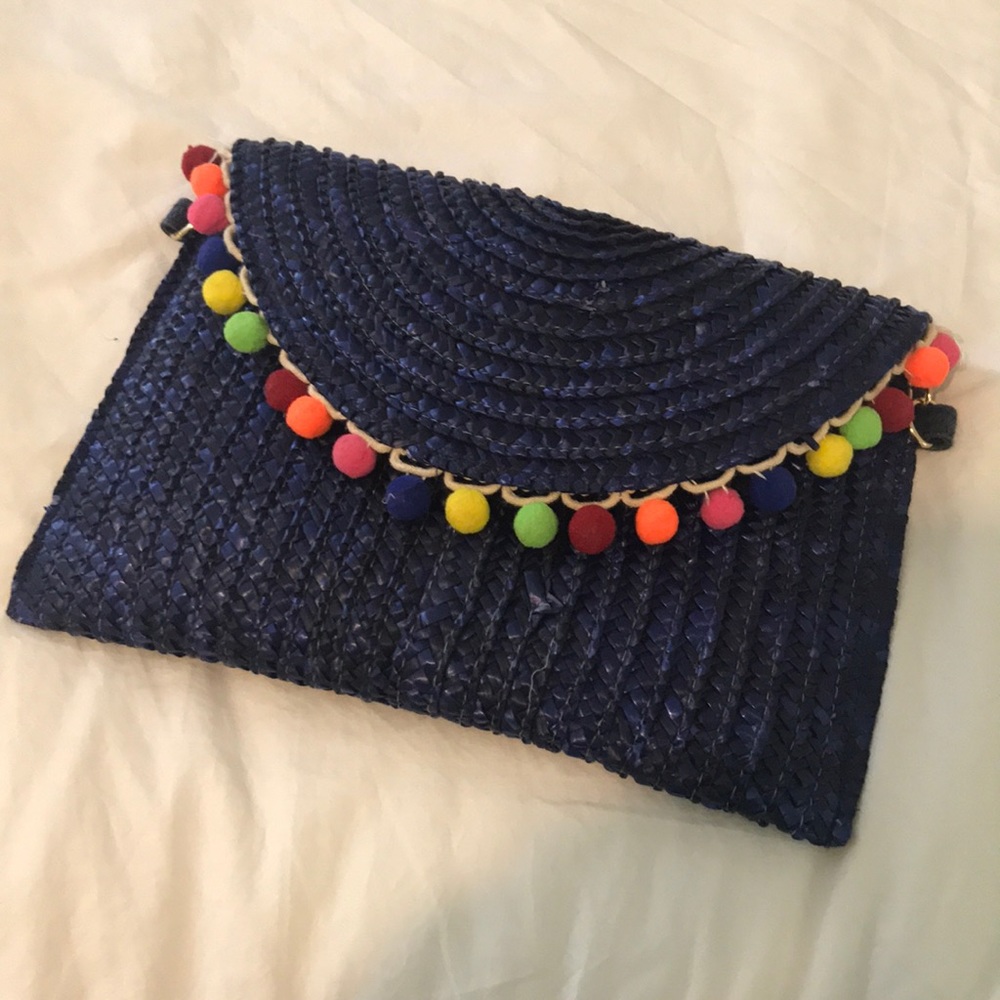NWOT tuckernuck Pom Pom clutch